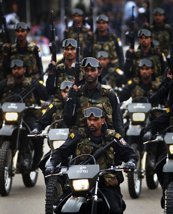 Special Forces Combat soldiers ride in a parade during a war victory ceremony in Colombo