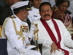 Commander of the Sri Lankan navy Samarasinghe speaks with Sri Lanka's President Rajapaksa in Colombo