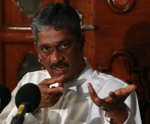 Fonseka speaks to reporters during a news conference in Colombo