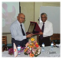 T. Kandasamy Receiving Award from Dr. L.N. Senaweera Director General SLSI