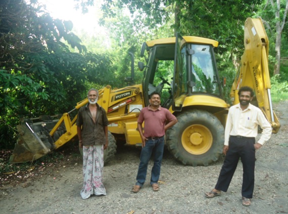 Community activist, Thompson Banda, with the bulldozer operators – May 5th 2016