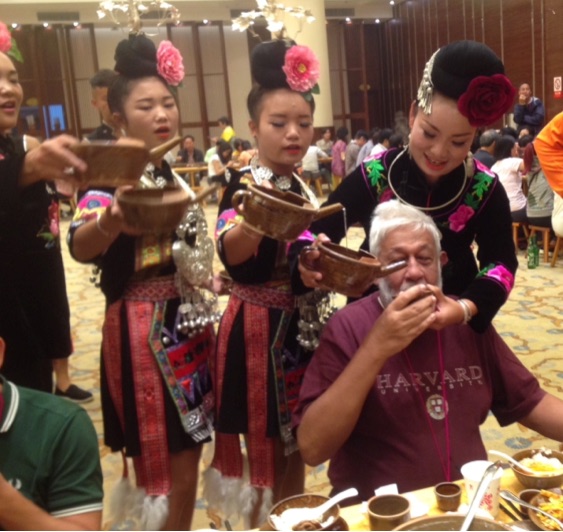 Miao Festival: Wine cassading into an ever willing mouth